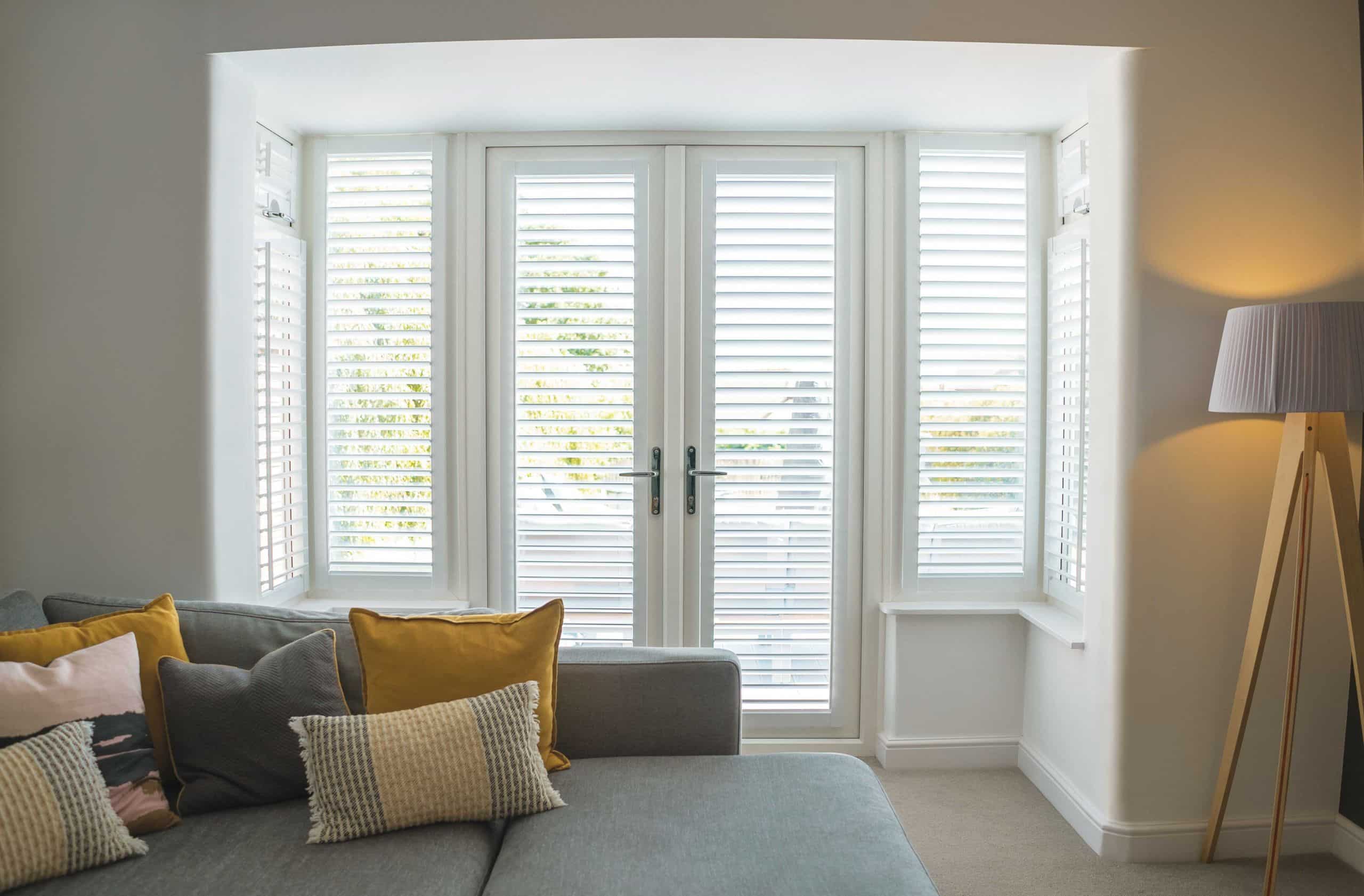 LL 2023 Perfect Fit Shutters Lite Cotton White Liv Main2 Web Blinds, Shutters & Awnings Warwickshire - Shady Blinds & Shutters Nuneaton